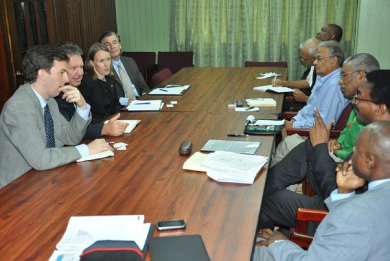 ‘Western diplomats meet APNU officials’:  In photo, from left (going clockwise) are Derek Lambe of the EU; British High Commissioner Andrew Ayre; Canadian High Commissioner Dr Nicole Giles; US Ambassador Brent Hardt; and APNU officials  - Joe Harmon, Ronald Bulkan, Dr Rupert Roopnaraine, David Granger, Basil Williams and Carl Greenidge, during their meeting on Tuesday.