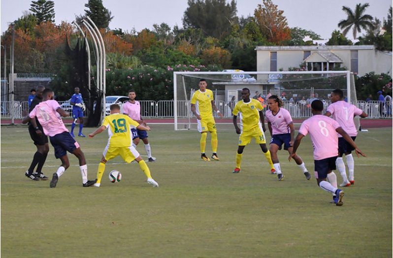 Guyana’s Stephen Duke-McKenna (#19), battling in the midfield during the first half of the Golden Jaguars vs Bermuda encounter. (Photo compliments: GFF)