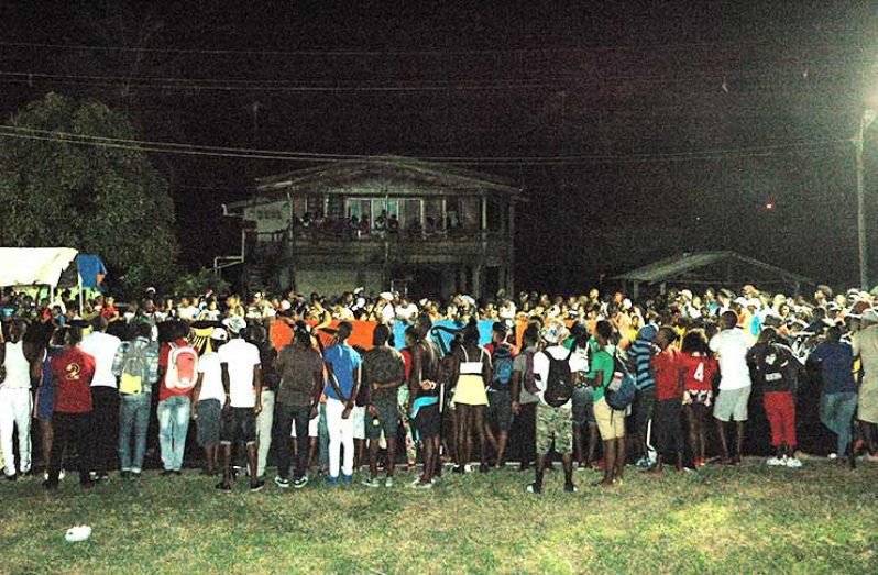 :  A section of the large crowd at the Haslington Market Tarmac on the opening night of the Guinness Cage Football tournament.