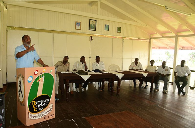 Dr Vincent Adams delivering his charge to the participants of DCC’s Junior Summer Camp as others at head table look on. (Adrian Narine photos)