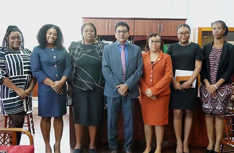 Attorney-General and Minister of Legal Affairs Anil Nandlall, SC, flanked by members of the Regional Law Revision Centre and other local experts