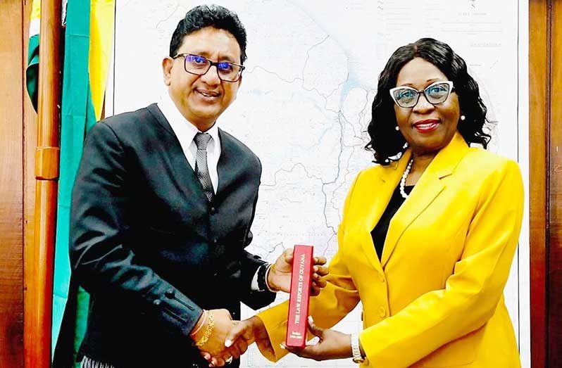Attorney General and Minister of Legal Affairs, Anil Nandlall and Chief Justice of Belize, Justice Louise Esther Blenman.