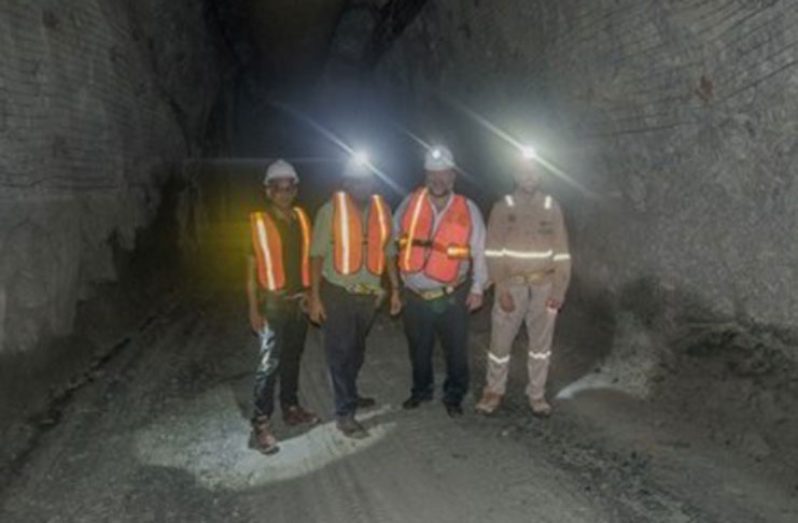 Minister of Natural Resources, Hon. Raphael Trotman, with Senior Vice-President, Strategy and Corporate Affairs of AGM, Perry Holloway [right], and Senior Vice-President and Chief Operating Officer, Suresh Kalathil [left], and a company engineer during a visit to the underground tunnel where exploration is currently taking placeMinister of Natural Resources, Hon. Raphael Trotman, makes his way out of the underground tunnel at AGM where exploration is currently taking place