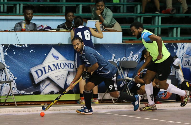 Trinidad and Tobago’s national striker Akim Toussant on the attack for Queen’s Park against Mixed Nuts.