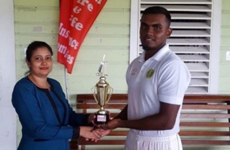 Man-of-the-match Alex Algoo receives his award for his brilliant 175 against the Select U-17s.