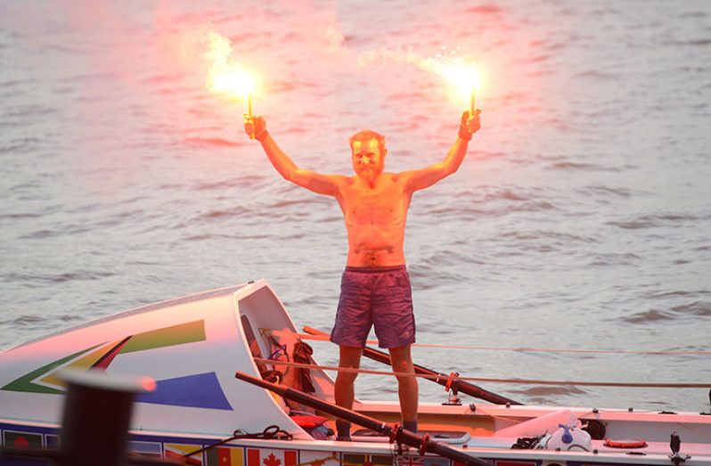 Allen ignites two flares in celebration of his successful 3,000-mile journey (Samuel Maughn photo)