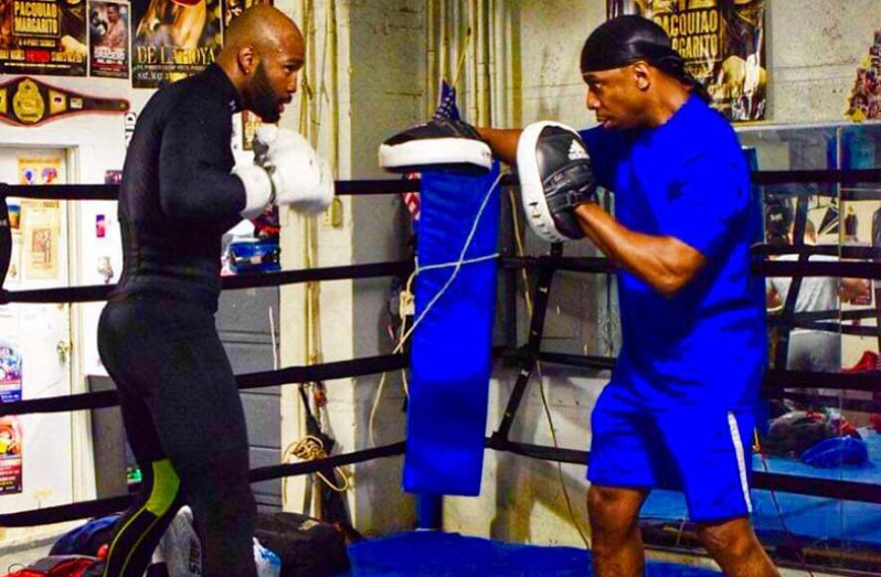 Lennox ‘Too Sharp’ Allen (left) during a recent training session ahead of his February 15 fight against American Derrick ‘Take it to the Bank’ for the Interim World Boxing Association (WBA) Super Middleweight Title.