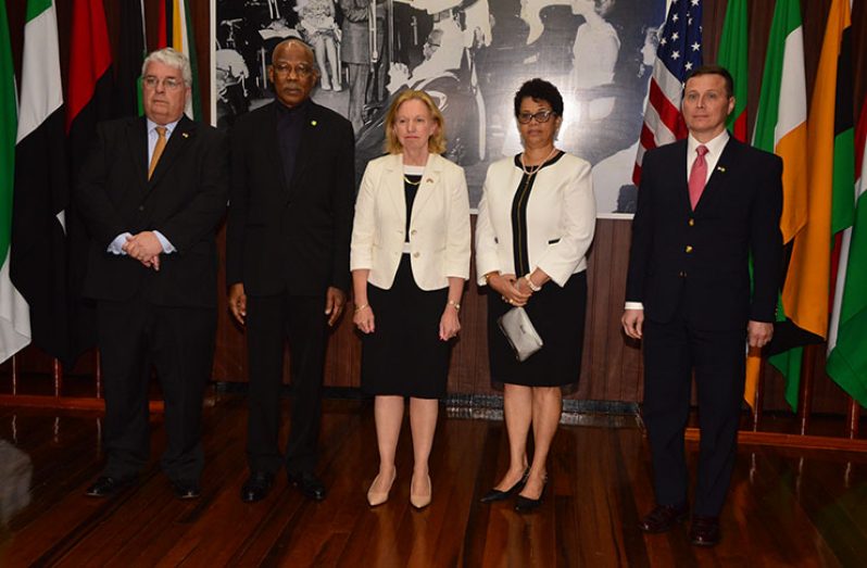 President David Granger and Ambassador of the United States (US) to Guyana, Sarah-Ann Lynch, pause for a photograph on Wednesday during the accreditation ceremony.
Also in the photo from left are: Spouse of the Ambassador, Dr. Kevin Healy; Director General of the Ministry of Foreign Affairs, Audrey Jardine-Waddell; and Deputy Chief of Mission (DCM) at the U.S. Embassy in Georgetown, Terry Steers-Gonzalez  (Adrian Narine photo)