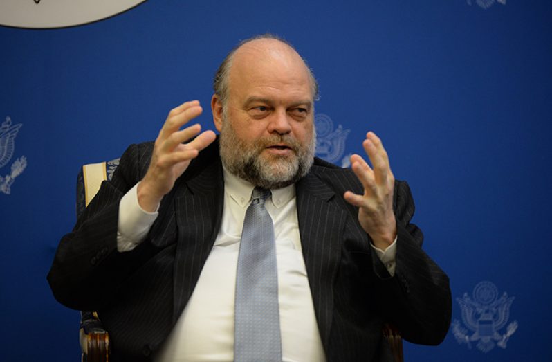 Outgoing United States (US) Ambassador Perry Holloway discusses the Guyana-Venezuela border controversy at the US Embassy (Delano Williams)