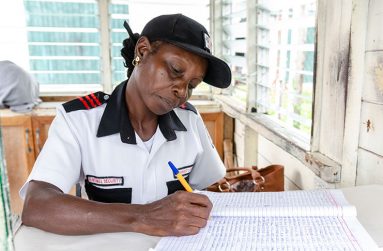 Dawn Cambridge at her job, performing her duties as a security guard (Delano Williams photos)