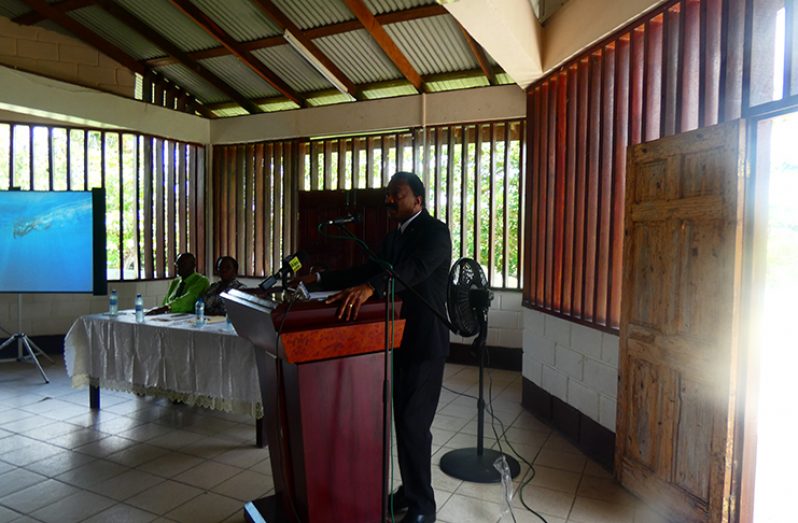 Attorney General and Minister of Legal Affairs Basil Williams addressing the audience