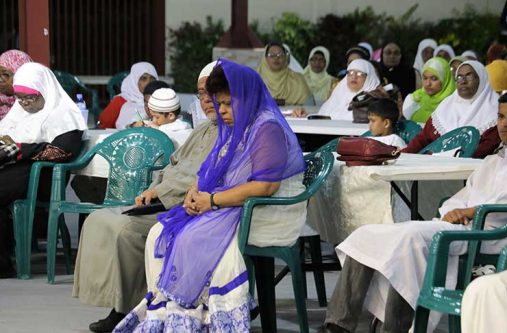 Minister of Social Protection, Hon. Amna Ally in deep meditation at the programme