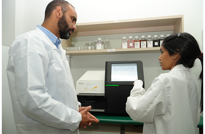 CARPHA’s Mohamed Elsherbiny, Senior Technical Advisor, Office of the Executive Director and Neeta Oudit, AMR Laboratory Specialised Technologist, utilise Whole Genome Sequencing (WGS) technology to generate detailed genomic data that strengthens antimicrobial resistance (AMR) surveillance
