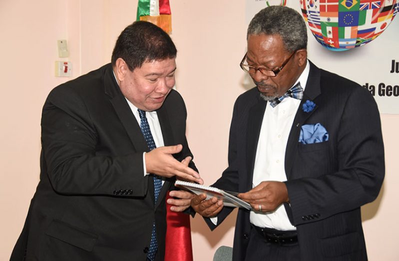 Mexico’s Ambassador to Guyana , Ivan Robero Sierra Medel and Vice-Chancellor of the University of Guyana, Dr Ivelaw Griffith, share a light moment following Thursday’s press briefing at the Mexican embassy on Brickdam