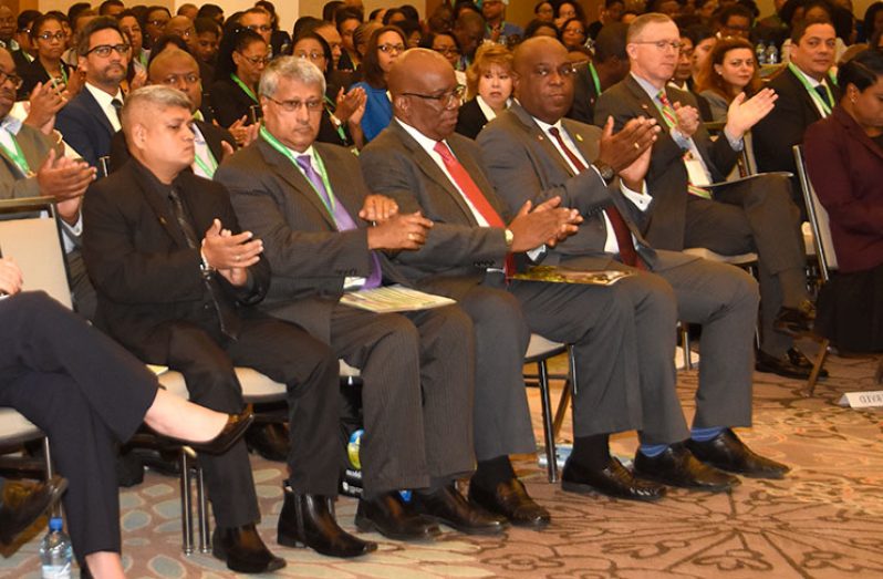 Minister of Finance, Winston Jordan along with Junior Finance Minister
Jaipaul Sharma and other officials in front row at the opening of the ICAC
conference (Adrian Narine photo)