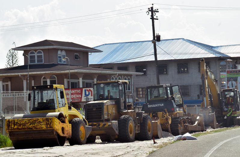 Men at work on the ECD road expansion