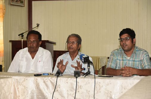 GAWU President , Komal Chand ( centre) , flanked by the union’s General Secretary , Seepaul Narine ( left) and Assistant General Secretary, Aslim Singh ( right)