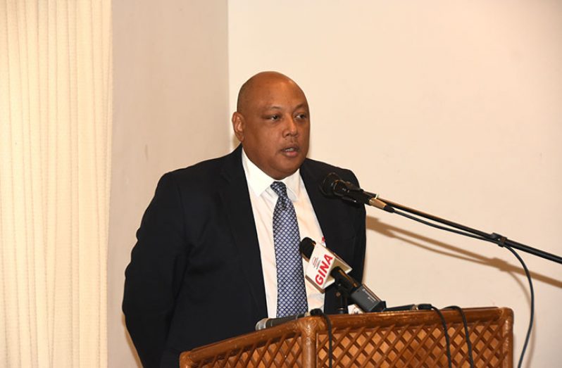 Minister of Natural Resources Raphael Trotman addressing the breakfast briefing on Thursday