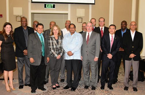 Prime Minister, Moses Nagamootoo, centre, stands alongside other Government officials including Minister of State, Joseph Harmon (second left) at the Georgetown Marriott Hotel where the Government team met officials of ExxonMobil Wednesday morning. Exxon’s Country Manager Jeff Simons is at the Prime Minister’s left (Adrian Narine photo)