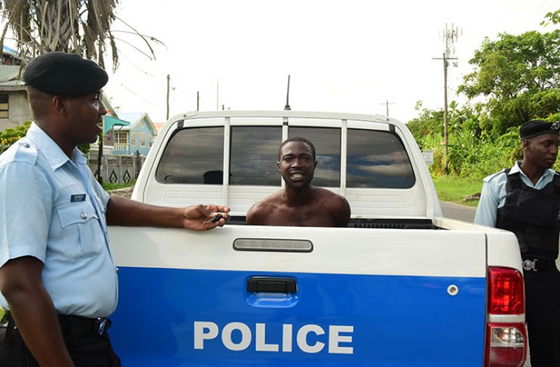 Police guard the suspected bandit
