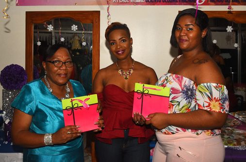 Owner of Toxic Shade of Beauty, Askalee Wray with two customers at the opening