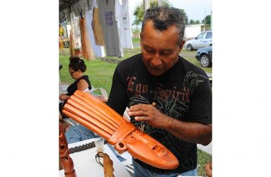 Artist Roland Taylor and his masterpiece the “Chief’s Mask”