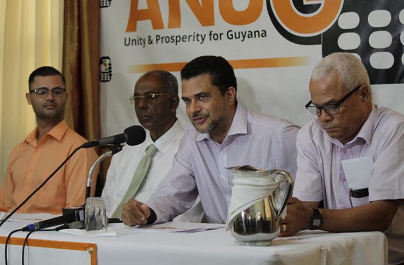 Chairman of ANUG, Timothy Jonas (second right) makes a point at the party’s press conference. Also seated at table (from left) are: Assistant Secretary, Kian Jabour (left); General Secretary, Ralph Ramkarran; and Financial Secretary, Jonathon Yearwood (Vishani Ragobeer photo)