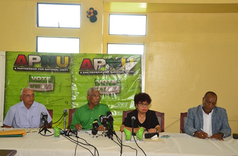 At the APNU campaign launch Friday at Congress Place are, from left: Minister of Communities Ronald Bulkan; Party Chairman, President David Granger; Social Protection Minister and PNCR General-Secretary, Amna Ally; and Minister of State and APNU General- Secretary, Joseph Harmon (Photo by Adrian Narine)