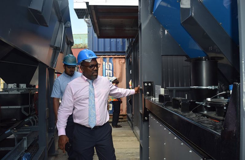 Demerara Harbour Bridge Corporation (DHBC) General Manager, Rawlston Adams inspects the new equipment