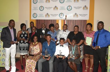 The winners displaying their awards (Adrian Narine photo)
