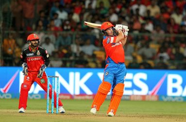 Aaron Finch looks on after smacking the ball for a six.