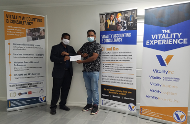 Vitality director, Abbas Hamid, hands over sponsorship to RHTY&SC Vice President, Mark Papannah