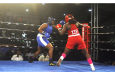 Guyana's Abiola Jackman (right) beat T&T's Angel George in a fight that could have gone either way (Sean Devers photo)