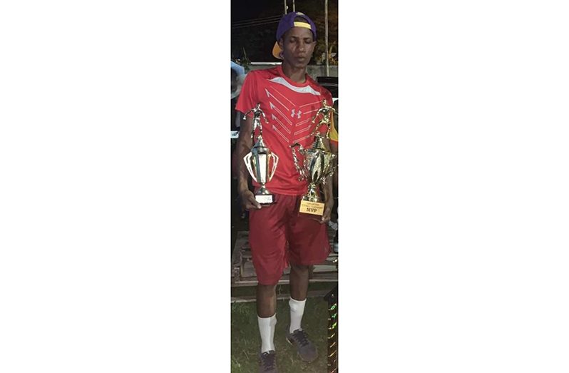 Former National forward, Anthony 'Awo'Abrams with his MVP and Top Goal-scorer trophies won in the just concluded Masters football over 40s