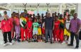 President of the Guyana Boxing Association, Steve Ninvalle, (fifth from right) with youngsters of the academy and coaches.