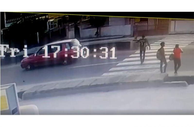 A screen grab shows the man making his way across the McDoom Public Road moments before he was struck down.