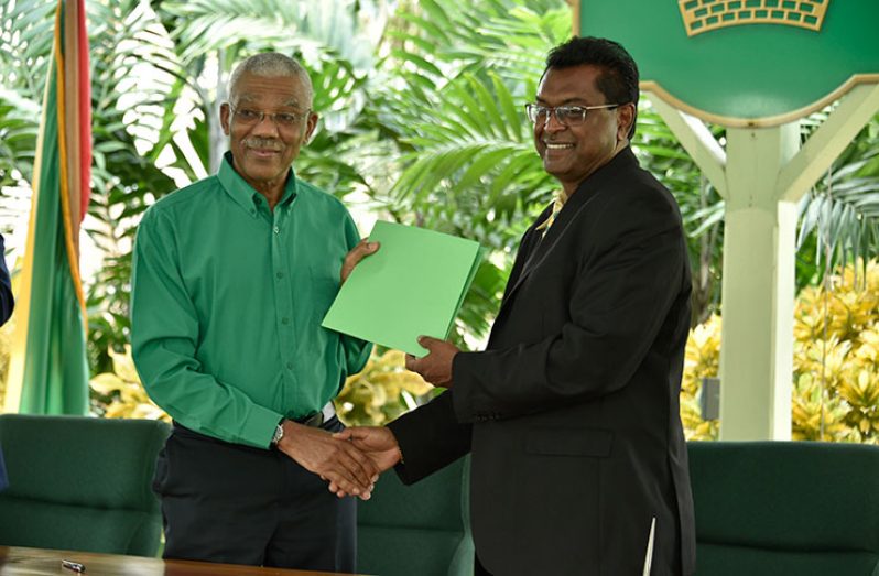 APNU Chairman, President David Granger (third from left), and Leader of the AFC, Khemraj Ramjattan (centre), standing alongside other representatives of the APNU+AFC Coalition