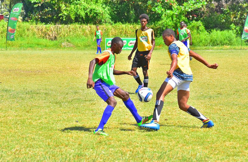 Milo Schools Football action continued yesterday at the Ministry of Education ground (Samuel Maughn Photo)