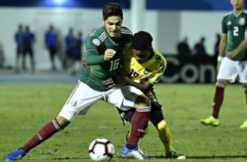 Part of the action in the match between Reggae Boyz and Mexico in the CONCACAF u-20 CHAMPIONSHIP