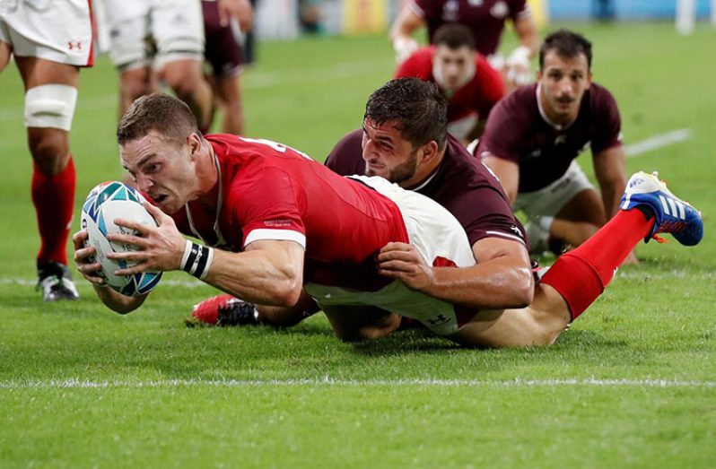 Wales' George North scores their sixth try REUTERS/Matthew Childs
