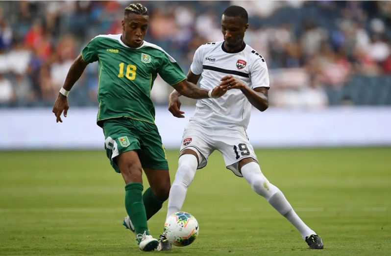  FLASHBACK! Action between Guyana’s Neil Danns (#16) and Kevan Leon George of Trinidad and Tobago in a Group D match of CONCACAF Gold Cup on June 26, 2019 in Children Mercy in Kansas City, Kansas (Photo compliments: CONCACAF)