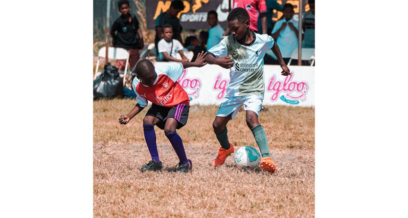 Action in the round of 16 of the Courts Optical Pee Wee Football Competition