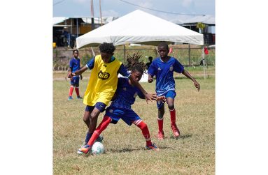 Action This Japhet Savory photo shows round of sixteen action from last week at the Ministry of Education ground on Carifesta Avenue