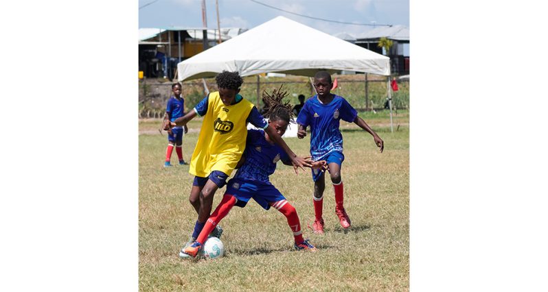 Action This Japhet Savory photo shows round of sixteen action from last week at the Ministry of Education ground on Carifesta Avenue