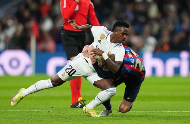 Vinicius Jnr and Frenkie de Jong grappled in a first-half flashpoint at the Bernabeu.