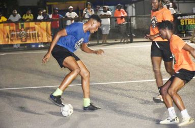 Flashback! A scene from the quarterfinal fixture between Showstoppers (blue) and Jetty Gunners.