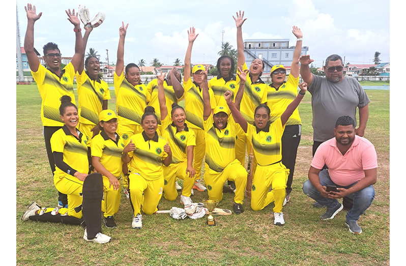 Essequibo celebrate the 50-over trophy after beating Berbice in yesterday’s final