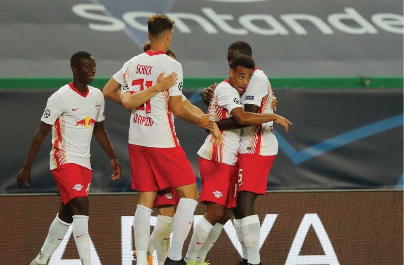 RB Leipzig v Atletico Madrid - Estadio Jose Alvalade, Lisbon, Portugal -  RB Leipzig's Tyler Adams celebrates scoring their second goal with teammates, as play resumes behind closed doors following the outbreak of the coronavirus disease (COVID-19) Miguel A. Lopes/Pool via REUTERS