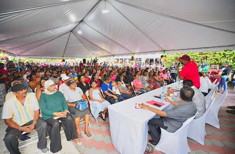 President Dr. Mohamed Irfaan Ali addresses the residents of Leonora and the neighbouring communities, on Monday, at State House in Region Three