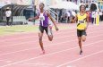 Afi Blair (left) of Government Technical Institute finished ahead of Kaidon Persaud in the U-20 400m final